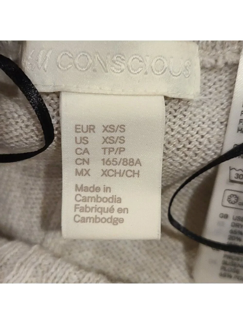 H&M Conscious Cream oversized wool blend poncho sweater
